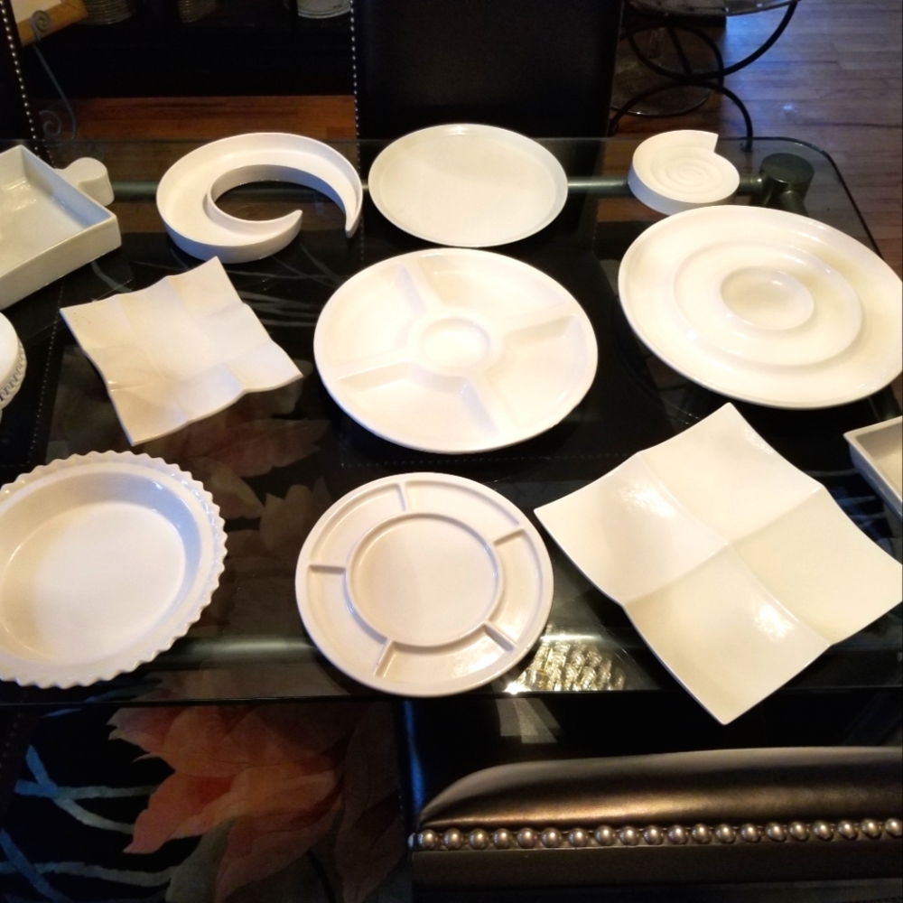 Collection of quality serving pieces. Most brand new. All pristine condition.
